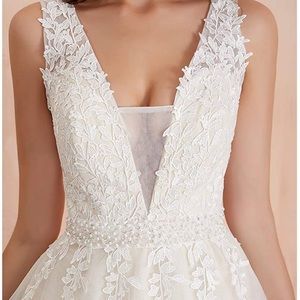Wedding dress size 14, color ivory